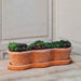 Costa Planter Terra Nova S/3 on the concrete with gray background