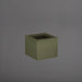 Cuba Low Corner Fiberglass Planter in matte bronze against gray background.