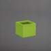 Cuba Low Corner Fiberglass Planter in satin green against gray background.