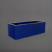 Cuba Low Rectangle Fiberglass Planter in matte cobalt blue against gray background.