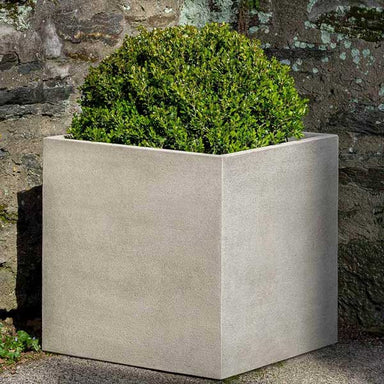 Cube Series Planter, Extra Large filled with plants in the backyard.