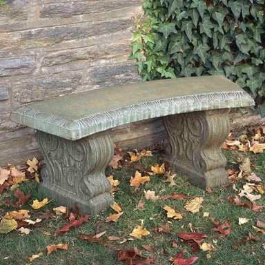 Curved Traditional Bench on grass in the backyard