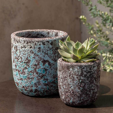 Dao Planter - Verdigris - S/8 on table filled with plants