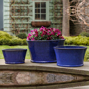 Darrowby Planter - Riviera Blue - S/3 on ledge in the backyard