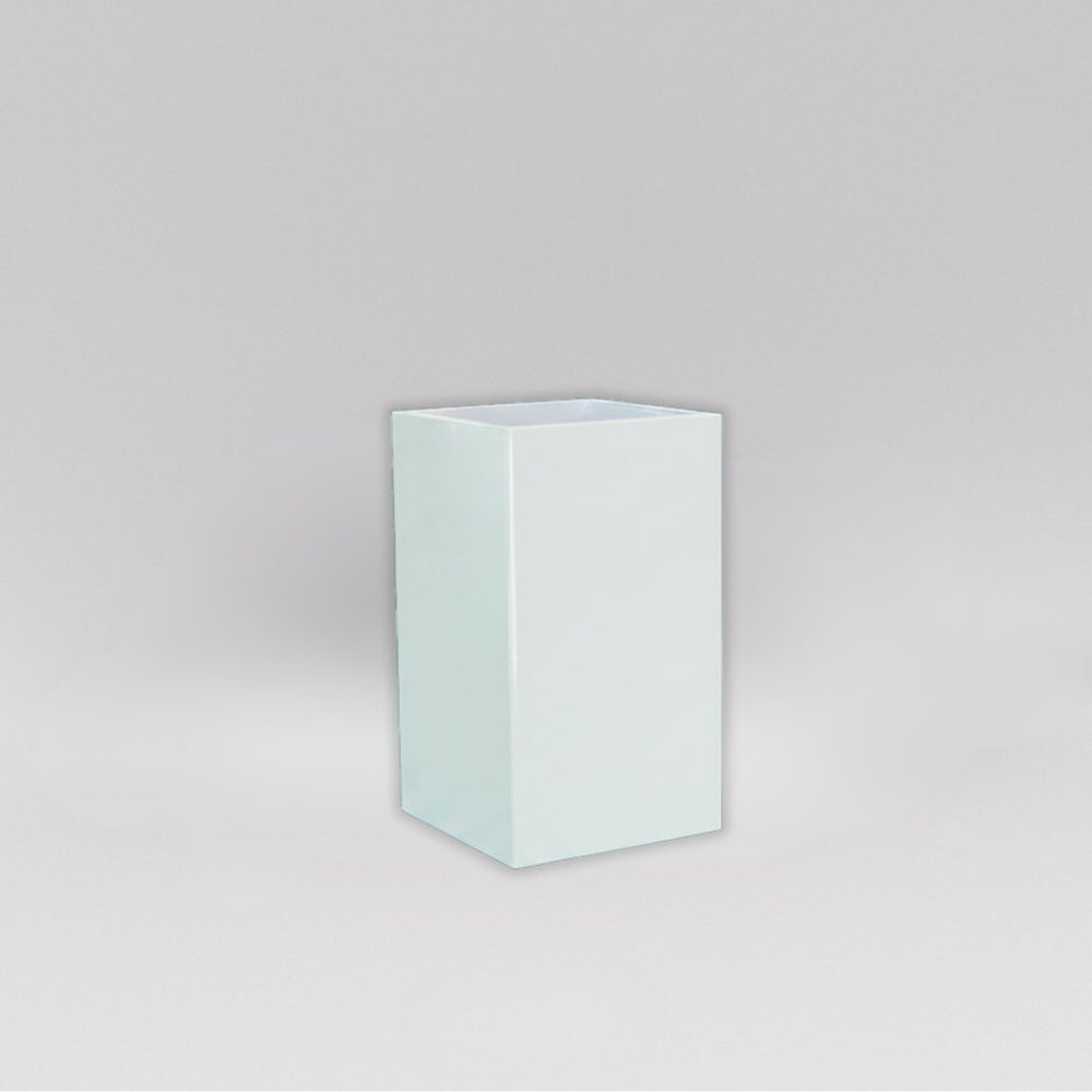 Darwin Tall Corner Fiberglass Planter in gloss bright white against gray background.