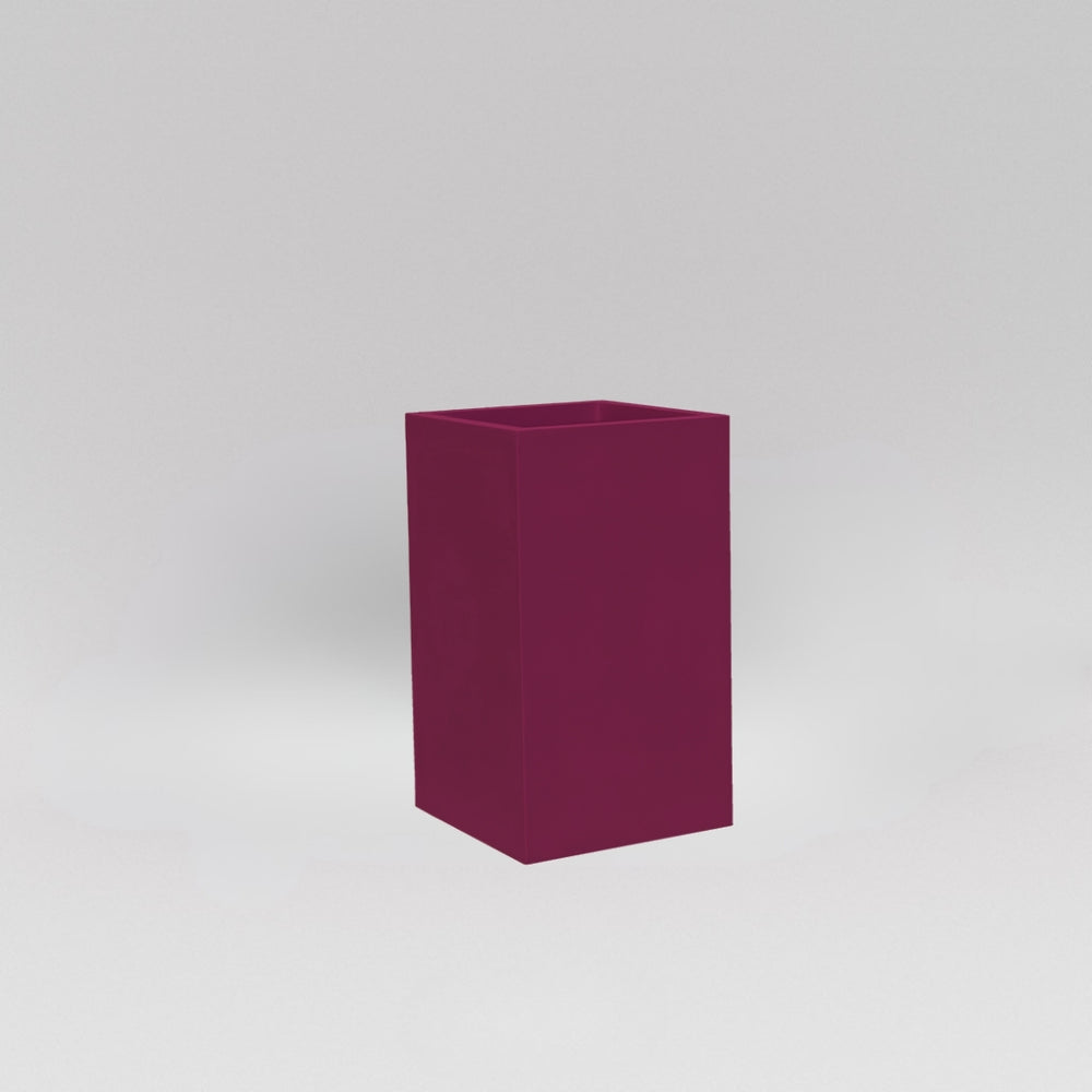 Darwin Tall Corner Fiberglass Planter in gloss eggplant against gray background.
