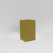 Darwin Tall Corner Fiberglass Planter in gloss metallic gold against gray background.