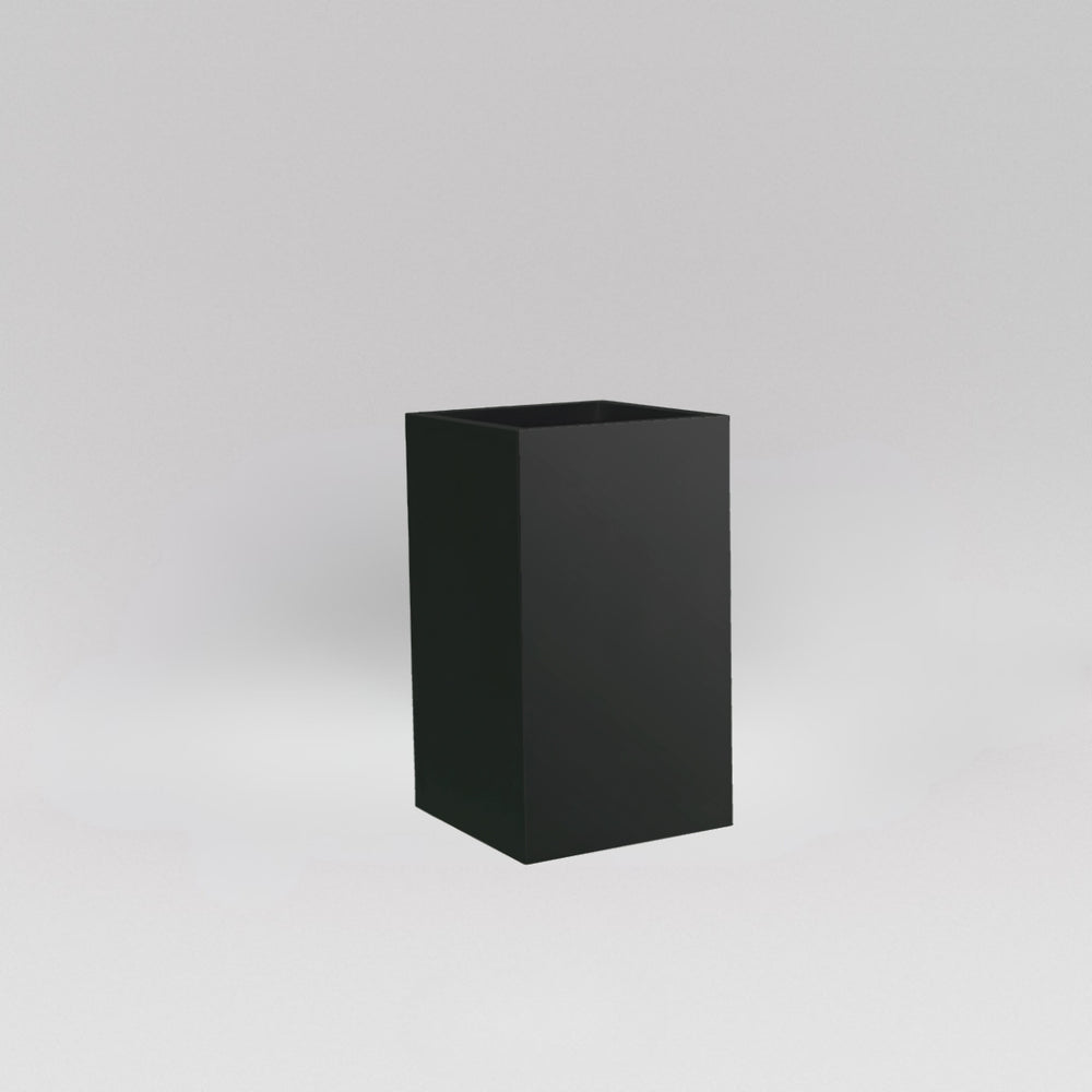Darwin Tall Corner Fiberglass Planter in matte black against gray background.