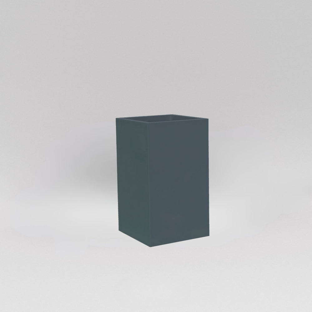 Darwin Tall Corner Fiberglass Planter in matte charcoal against gray background.