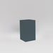 Darwin Tall Corner Fiberglass Planter in matte charcoal against gray background.