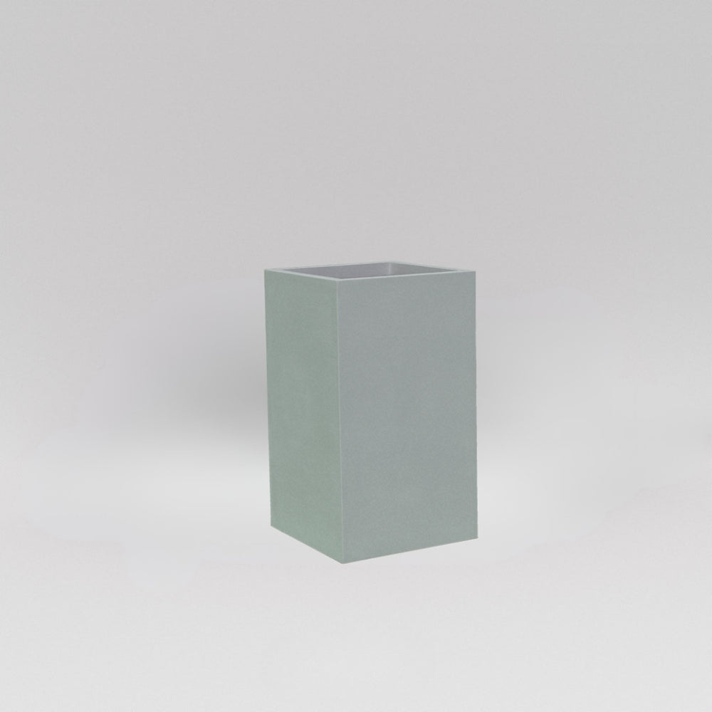 Darwin Tall Corner Fiberglass Planter in metallic silver against gray background.