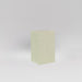 Darwin Tall Corner Fiberglass Planter in satin beige against gray background.