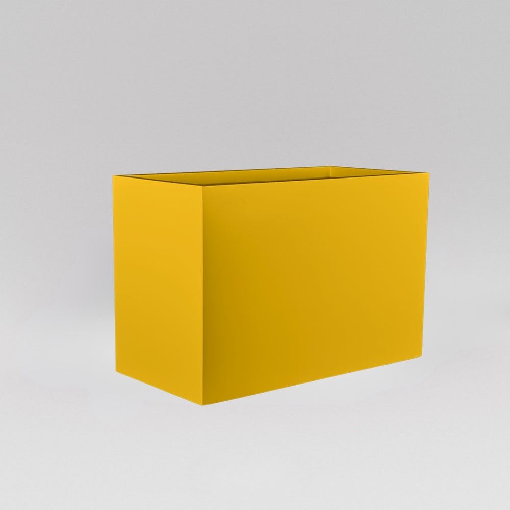 Darwin Tall Rectangle Fiberglass Planter in gloss saffron against gray background.