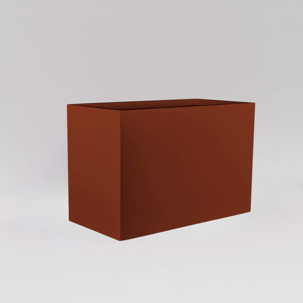 Darwin Tall Rectangle Fiberglass Planter in matte terra cotta against gray background.