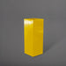 Delray Tall Corner Fiberglass Planter in gloss saffron against gray background.