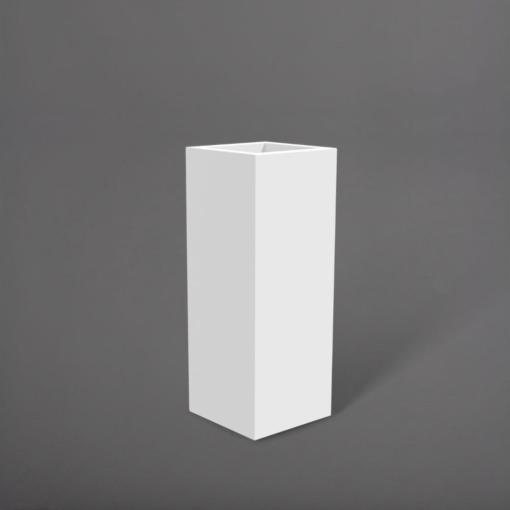 Delray Tall Corner Fiberglass Planter in matte bright white against gray background.