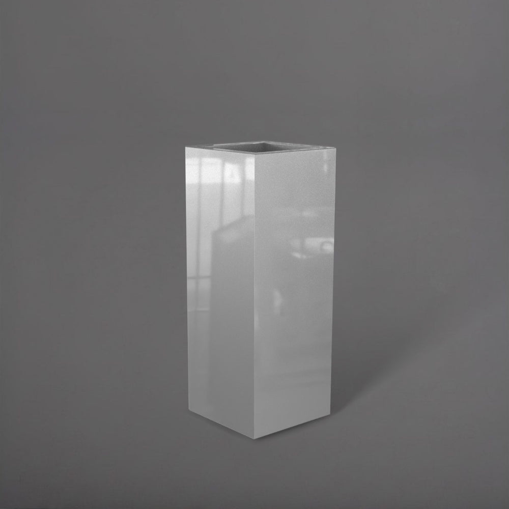 Delray Tall Corner Fiberglass Planter in metallic silver against gray background.