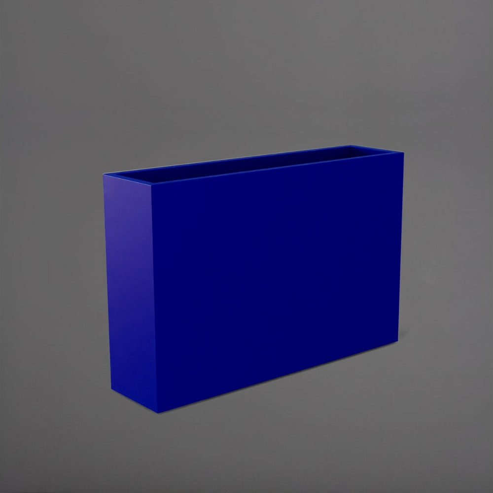 Delray Tall Rectangle Fiberglass Planter in matte cobalt blue against gray background.