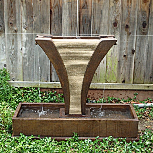 Diesse Fountain with Side Spillways in action in the backyard.