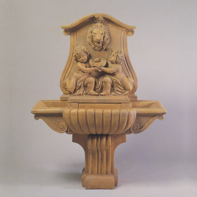 Donatello Lavabo Wall Fountain against gray background.