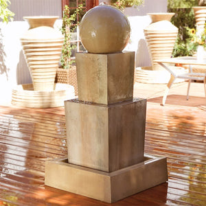 Double Obtuse with Ball Modern Outdoor water feature on patio