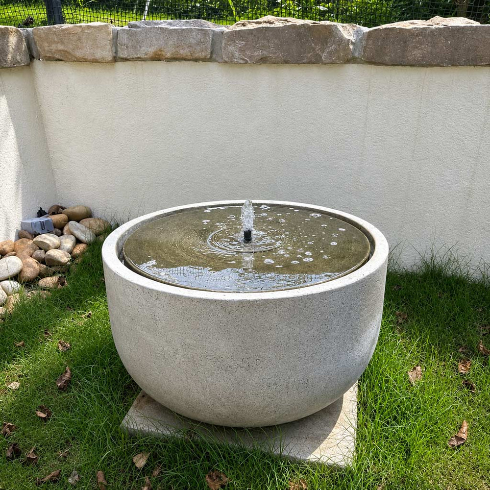 Echo Park Fountain on grass in the backyard.