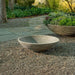 Enso Bowl 24 inch on gravel in the backyard.