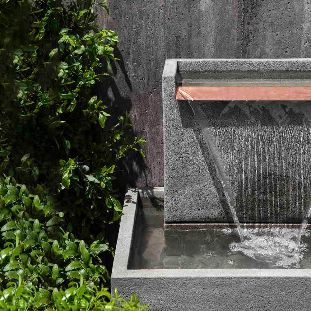 Falling Water 2 Fountain on gravel in action upclose.