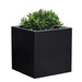 Farnley Planter 1818 S/1 in onyx black lite filled with plants against white background.