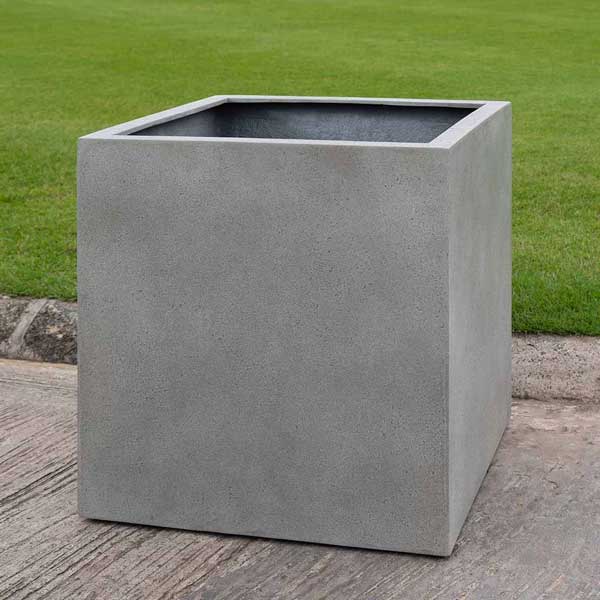 Farnley Planter 1818 S/1 in stone grey lite on concrete in the backyard.