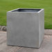 Farnley Planter 2828 S/1 in stone grey lite on concrete in the backyard.