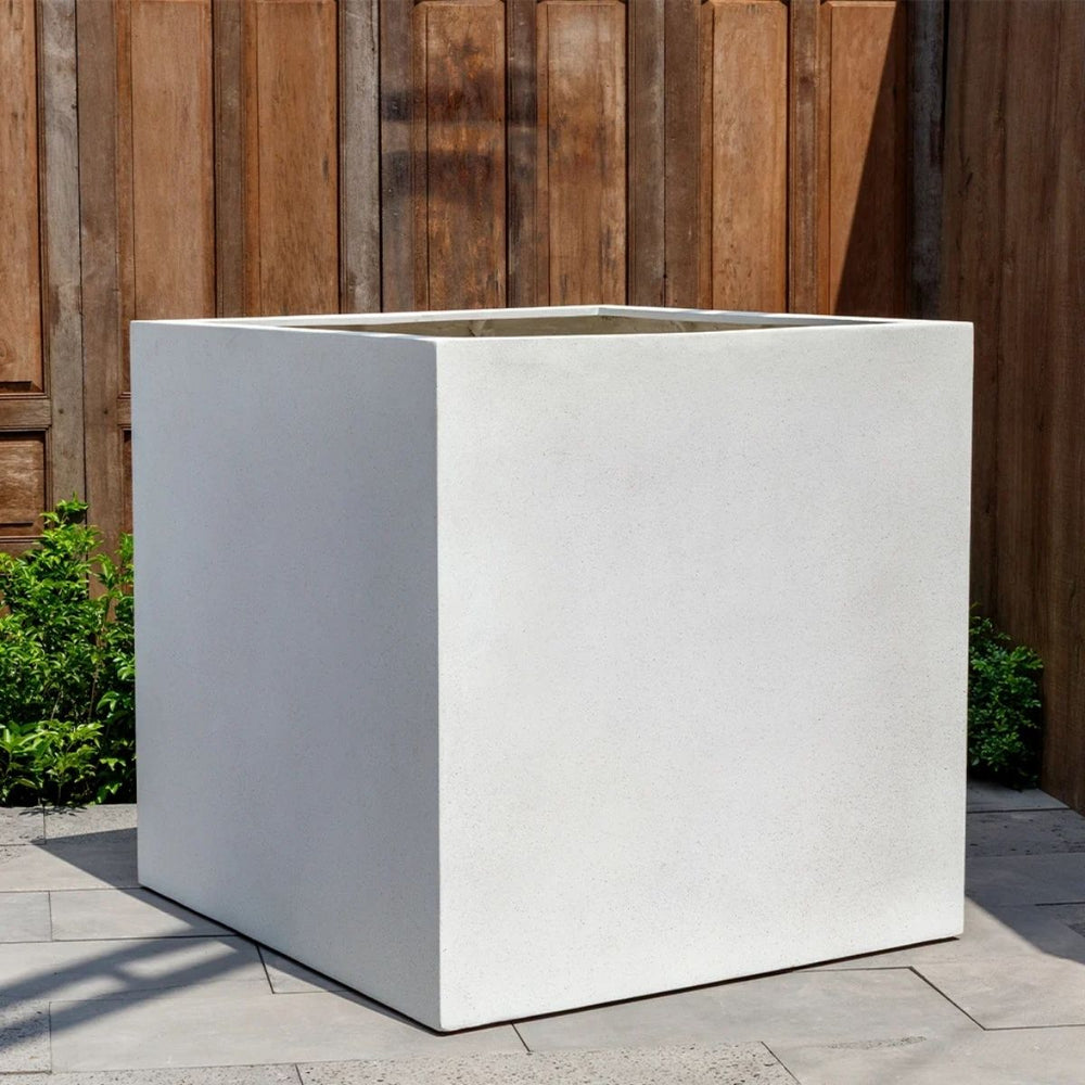 Farnley Planter 3636 S/1 in quartz premium on concrete in the backyard.
