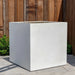 Farnley Planter 3636 S/1 in quartz premium on concrete in the backyard.