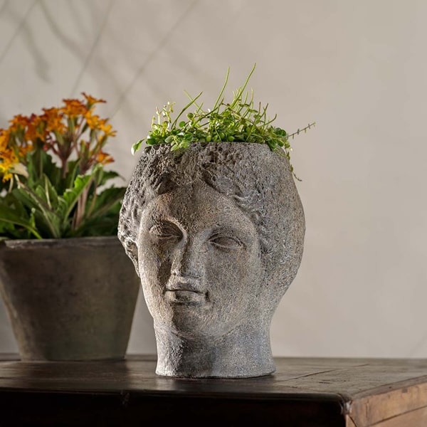 Flavia Planter on table filled with plants