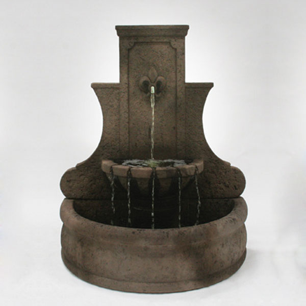 Fleur De Lis Wall fountain running against white background