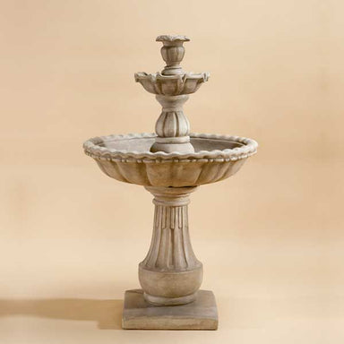 Gaetana Two Tier Fountain against brown background.