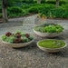 Garden Bowl shown in different sizes in the backyard.