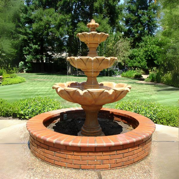 Gardenia Three Tier Fountain in action in the garden.