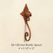 Gi-125 Iron Rustic Spout against brown background.