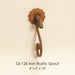 Gi-126 Iron Rustic Spout against brown background.
