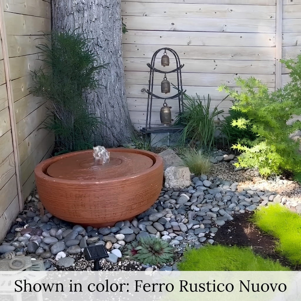 Girona Fountain in rock garden in action