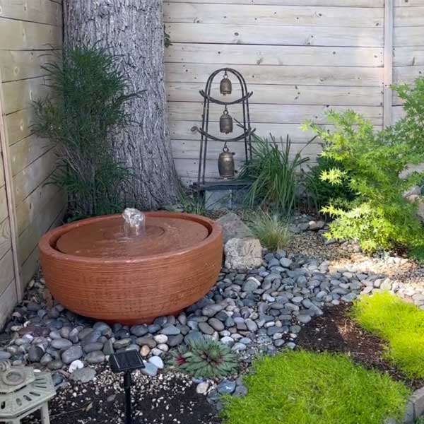 Girona Fountain in rock garden in action