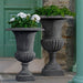 Glasgow Urn - Lead in concrete filled with white flowers