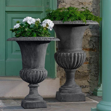 Glasgow Urn Planter - Lead in concrete filled with white flowers