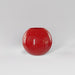Globe Fiberglass Planter in gloss red against gray background.