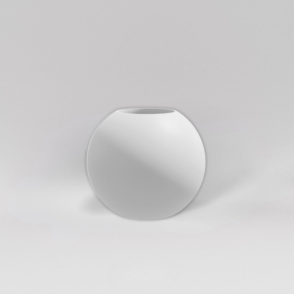 Globe Fiberglass Planter in matte bright white against gray background.