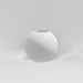 Globe Fiberglass Planter in matte bright white against gray background.