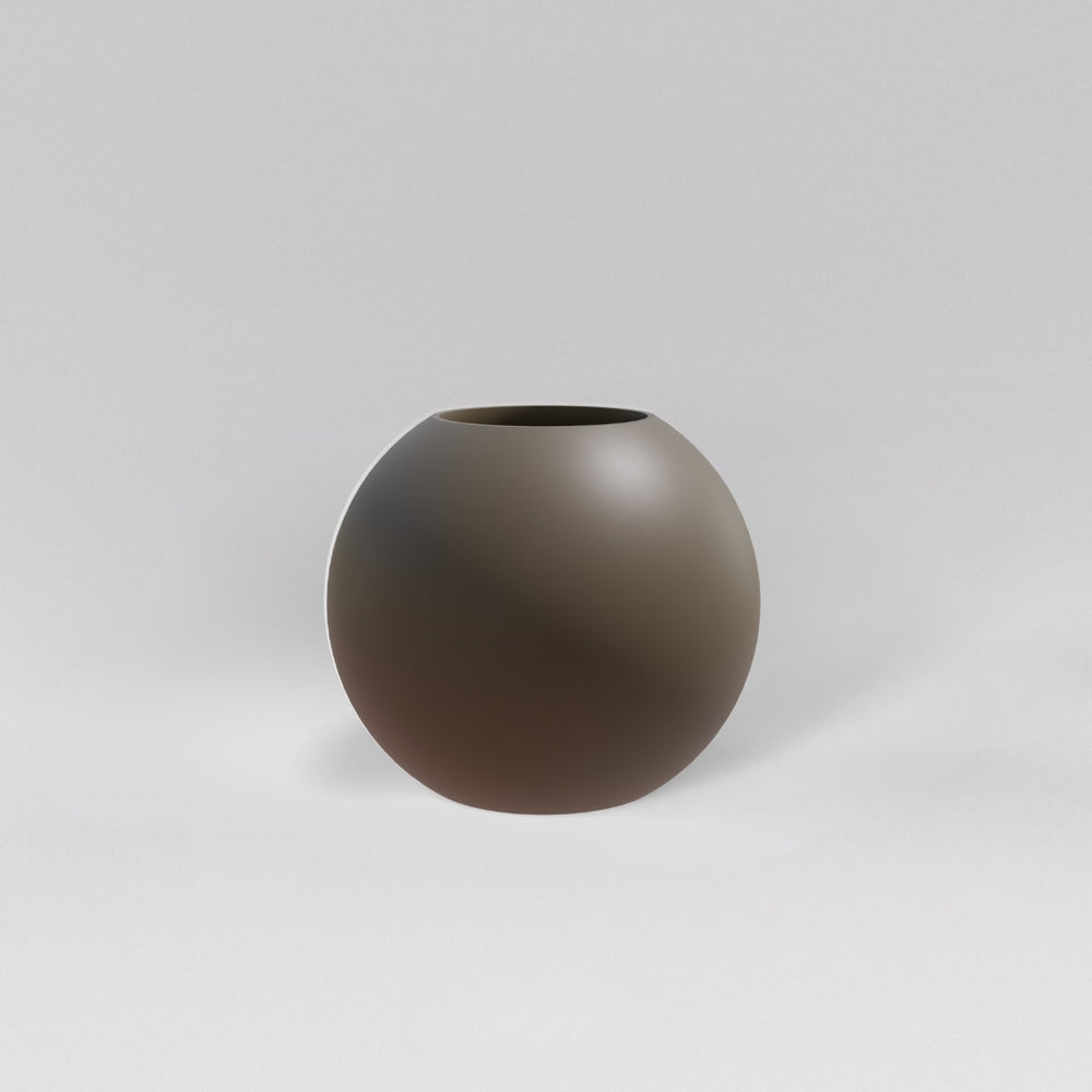 Globe Fiberglass Planter in matte bronze against gray background.