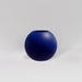 Globe Fiberglass Planter in matte cobalt blue against gray background.