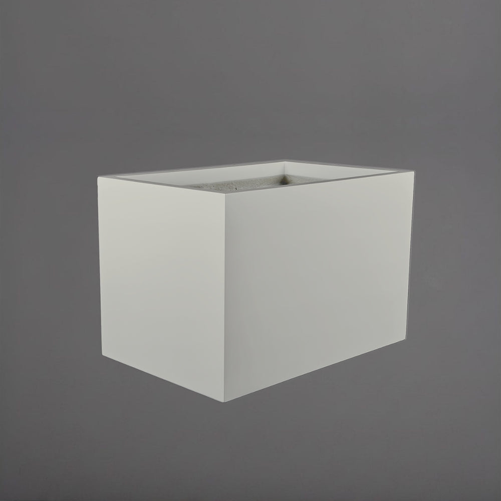 Granada Wide Rectangle Fiberglass Planter in matte cement grey against gray background.